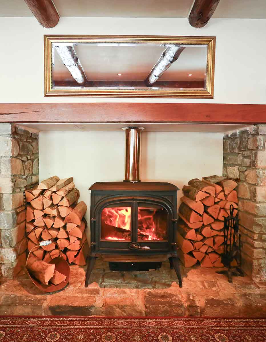 wood buring stove in the avajan lodge french pyrenees image of