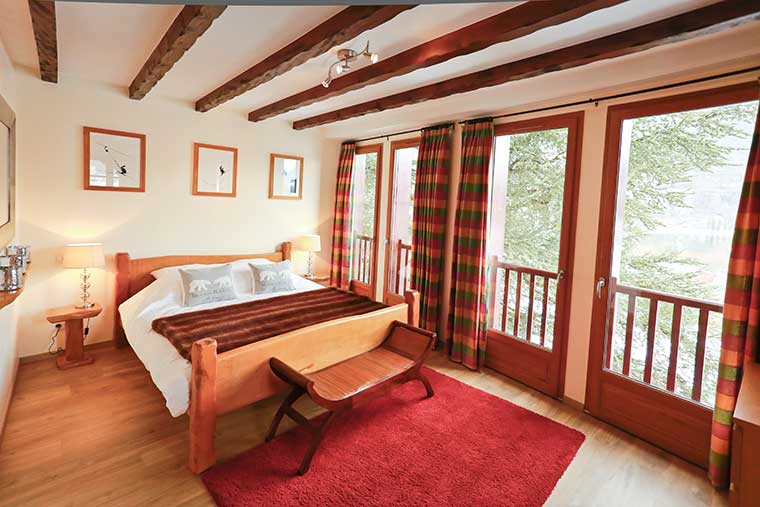 Bedroom in l'ancienne poste avajan lodge french pyrenees image of